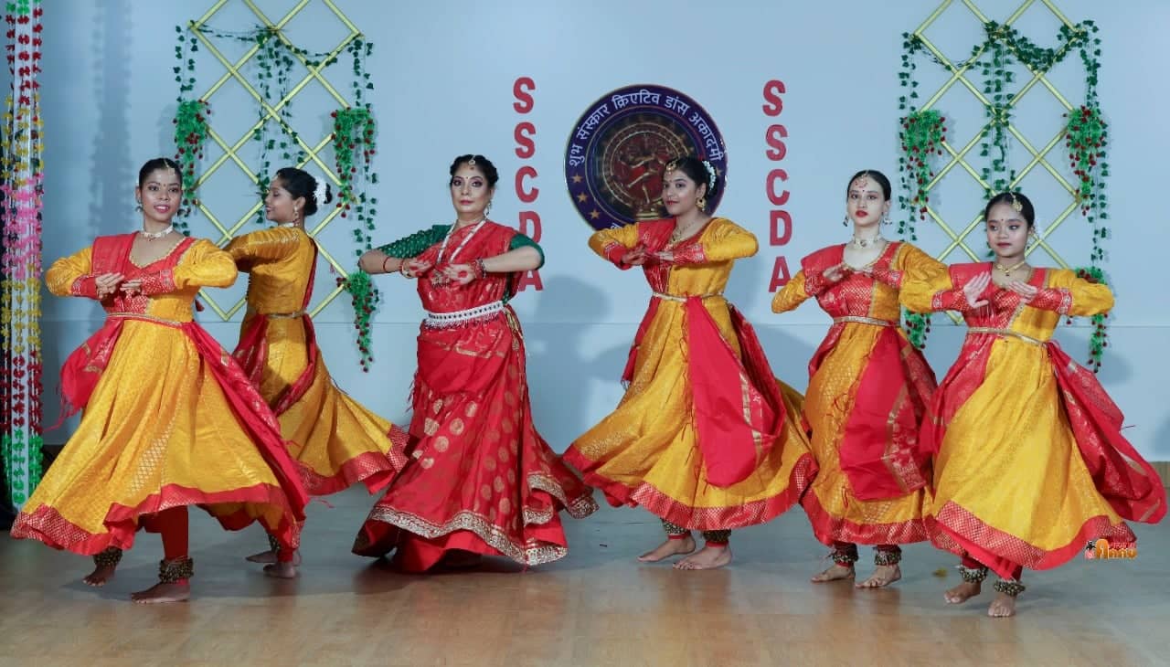 A senior student mid-chakkar during a Kathak class
